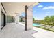 This backyard features a large patio, desert landscaping, a pool, and unobstructed views at 10641 E Blue Sky Dr, Scottsdale, AZ 85262