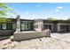 Stunning contemporary home with a sleek design, private courtyard, and attached two car garage at 10641 E Blue Sky Dr, Scottsdale, AZ 85262