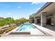 Backyard pool and spa feature desert landscaping, a covered patio, and unobstructed views at 10641 E Blue Sky Dr, Scottsdale, AZ 85262