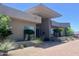 Contemporary home featuring modern architecture and desert landscaping at 10821 E Troon North Dr, Scottsdale, AZ 85262