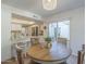 Cozy dining area, with access to the kitchen, and a patio area for indoor-outdoor living at 11416 N Century Ln, Scottsdale, AZ 85254