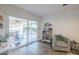 Comfortable living room with sliding glass doors, creating an inviting and relaxing space at 11416 N Century Ln, Scottsdale, AZ 85254
