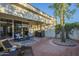 Charming covered patio featuring comfortable seating, and access to the lush backyard, perfect for outdoor enjoyment at 11416 N Century Ln, Scottsdale, AZ 85254
