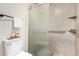Clean and well-maintained bathroom featuring a glass-enclosed shower at 13889 N 108Th Dr, Sun City, AZ 85351