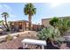 Exterior view of the community area showing desert landscaping with cactus and bench at 13889 N 108Th Dr, Sun City, AZ 85351