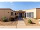 Charming single-story home with a xeriscaped front yard and covered entryway at 13889 N 108Th Dr, Sun City, AZ 85351