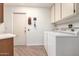 Functional laundry room with modern appliances and ample storage at 13889 N 108Th Dr, Sun City, AZ 85351