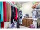 Organized walk-in closet with clothes racks and storage cabinets at 13889 N 108Th Dr, Sun City, AZ 85351