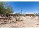 Picture of a spacious backyard offering many possibilities and privacy fencing at 1413 E Dobbins Rd, Phoenix, AZ 85042