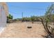 View of the backyard space featuring desert landscaping and room to roam at 1413 E Dobbins Rd, Phoenix, AZ 85042