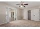 Cozy bedroom with sliding glass doors leading to a patio and a closet at 1413 E Dobbins Rd, Phoenix, AZ 85042