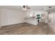 Open-concept layout showcasing a modern kitchen with an island and a spacious living area at 1413 E Dobbins Rd, Phoenix, AZ 85042