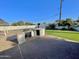 Outdoor space includes a barbecue area and covered concrete seating area in an enclosed yard at 1421 W Pasadena Ave, Phoenix, AZ 85013