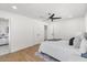Relaxing bedroom with a comfortable bed, stylish rug, and wood flooring at 1421 W Pasadena Ave, Phoenix, AZ 85013