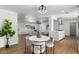 Bright dining area with natural light, seamlessly connected to the living room and modern kitchen at 1421 W Pasadena Ave, Phoenix, AZ 85013