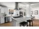 Modern kitchen with stainless steel appliances, a sleek gas range, and bright white cabinetry, perfect for cooking at 1421 W Pasadena Ave, Phoenix, AZ 85013