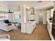 Open-concept living space with a view of the kitchen, dining area, and a comfortable living room setup at 1421 W Pasadena Ave, Phoenix, AZ 85013