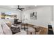 Inviting living room with modern decor, plush seating, and a large window offering plenty of natural light at 1421 W Pasadena Ave, Phoenix, AZ 85013