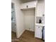 Pantry area featuring lots of storage space inside the cabinets, plus laundry area access at 1421 W Pasadena Ave, Phoenix, AZ 85013