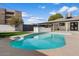 Beautiful pool, outdoor kitchen and artificial turf create an oasis at 1421 W Pasadena Ave, Phoenix, AZ 85013