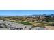 An aerial view shows the surrounding community and mountain backdrop at 15221 N Clubgate Dr # 2096, Scottsdale, AZ 85254