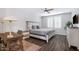 Bedroom featuring neutral colors, a queen-size bed, and window shutters at 15221 N Clubgate Dr # 2096, Scottsdale, AZ 85254