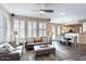 Bright living room featuring large windows and comfortable seating arrangements at 15221 N Clubgate Dr # 2096, Scottsdale, AZ 85254