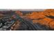 Stunning aerial view of desert mountains and highway at 1530 E Loma Ln, Phoenix, AZ 85020