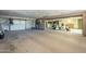 Spacious multi-car garage with a wide opening, and ample room for parking and storage at 1530 E Loma Ln, Phoenix, AZ 85020