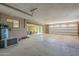 Expansive garage with multiple access points and plenty of room for vehicles or projects at 1530 E Loma Ln, Phoenix, AZ 85020