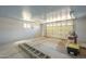 Garage with concrete floors, offering ample storage and space for a vehicle and tools at 1530 E Loma Ln, Phoenix, AZ 85020