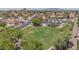 An aerial shot showcases the green space and convenient location near a park and recreational vehicle parking at 1549 N La Rosa Dr, Tempe, AZ 85288