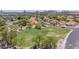 An aerial view reveals the proximity to a park and recreational vehicle parking, offering a glimpse of the community at 1549 N La Rosa Dr, Tempe, AZ 85288
