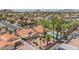 Beautiful aerial view of a home with desert landscaping, covered patio, and refreshing swimming pool at 1549 N La Rosa Dr, Tempe, AZ 85288