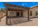 A shaded patio offers an ideal space for relaxing or entertaining, connecting indoor and outdoor living at 1549 N La Rosa Dr, Tempe, AZ 85288
