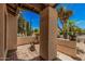 Inviting front porch with desert-style landscaping, adding a touch of natural beauty to the entrance at 1549 N La Rosa Dr, Tempe, AZ 85288