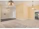 The large living room features tile flooring and abundant natural light, offering an inviting atmosphere at 1549 N La Rosa Dr, Tempe, AZ 85288