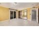This Living Room features tile flooring, sliding glass doors and natural lighting at 1549 N La Rosa Dr, Tempe, AZ 85288