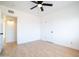 A bright bedroom is equipped with a ceiling fan and has a laminate floor at 1721 W Earll Dr, Phoenix, AZ 85015
