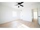 Bright bedroom features vinyl flooring, fresh paint and overhead fan at 1721 W Earll Dr, Phoenix, AZ 85015