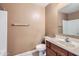 Functional bathroom with a combined toilet and sink, featuring a simple layout at 18182 W Desert Ln, Surprise, AZ 85388