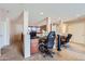 Office space featuring multiple desks and comfortable chairs at 18182 W Desert Ln, Surprise, AZ 85388