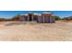 Elegant single-story home with a tile roof and a spacious driveway, perfect for a Gathering at 19621 W Minnezona Ave, Litchfield Park, AZ 85340
