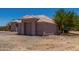 Attached garage with a tile roof is perfect for a car enthusiast at 19621 W Minnezona Ave, Litchfield Park, AZ 85340