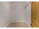 Walk-in closet with shelving and carpeted floor at 19621 W Minnezona Ave, Litchfield Park, AZ 85340