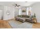 Comfortable living room features a large sectional couch, light walls and bright windows at 2150 E Bell Rd # 1088, Phoenix, AZ 85022