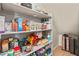 Organized pantry with an array of goods on shelves, enhancing storage capabilities in the home at 2150 E Bell Rd # 1088, Phoenix, AZ 85022