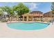 Community pool area featuring a blue pool and covered lounge area at 2150 E Bell Rd # 1088, Phoenix, AZ 85022