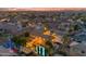 Aerial view of a well-maintained home with a pool and landscaped backyard in a friendly neighborhood at 21575 E Twin Acres Ct, Queen Creek, AZ 85142
