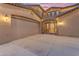 Stunning two-story home with a three-car garage and meticulously landscaped grounds, showcasing curb appeal at 21575 E Twin Acres Ct, Queen Creek, AZ 85142
